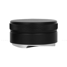 Load image into Gallery viewer, Macaron 54mm stainless steel coffee distribution tool on portafilter basket