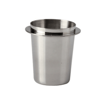 Load image into Gallery viewer, Coffee grounds transferred from dosing cup into 58mm portafilter
