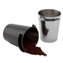 Load image into Gallery viewer, Coffee grounds transferred from dosing cup into 58mm portafilter
